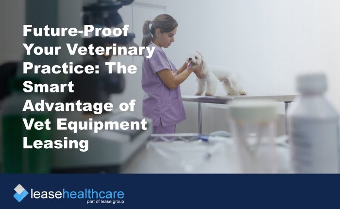 Image of veterinary examination room and a nurse in pink scrubs stroking a small white dog to demonstrate the benefits of vert equipment leasing