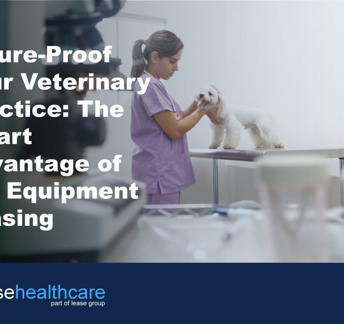 Image of veterinary examination room and a nurse in pink scrubs stroking a small white dog to demonstrate the benefits of vert equipment leasing